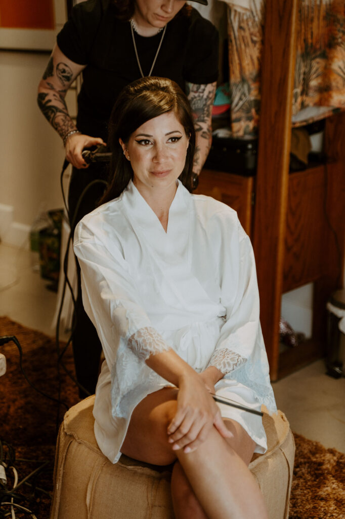 Bride getting hair done — Desert Wedding Photography by Mattie O'Neill