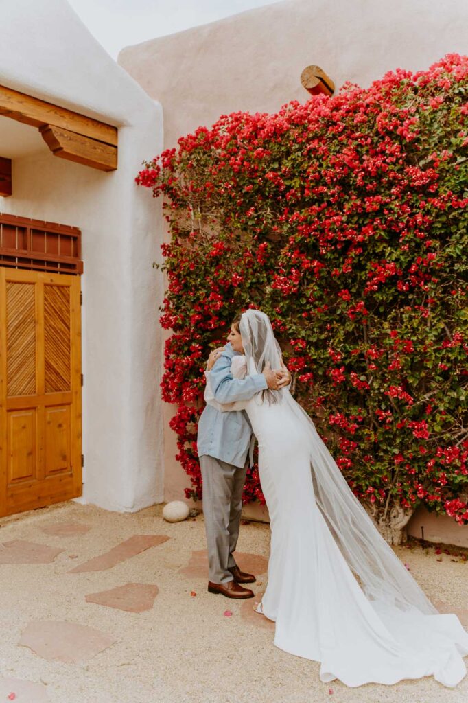 Father of the bride and bride hugging — Desert Wedding Photography by Mattie O'Neill