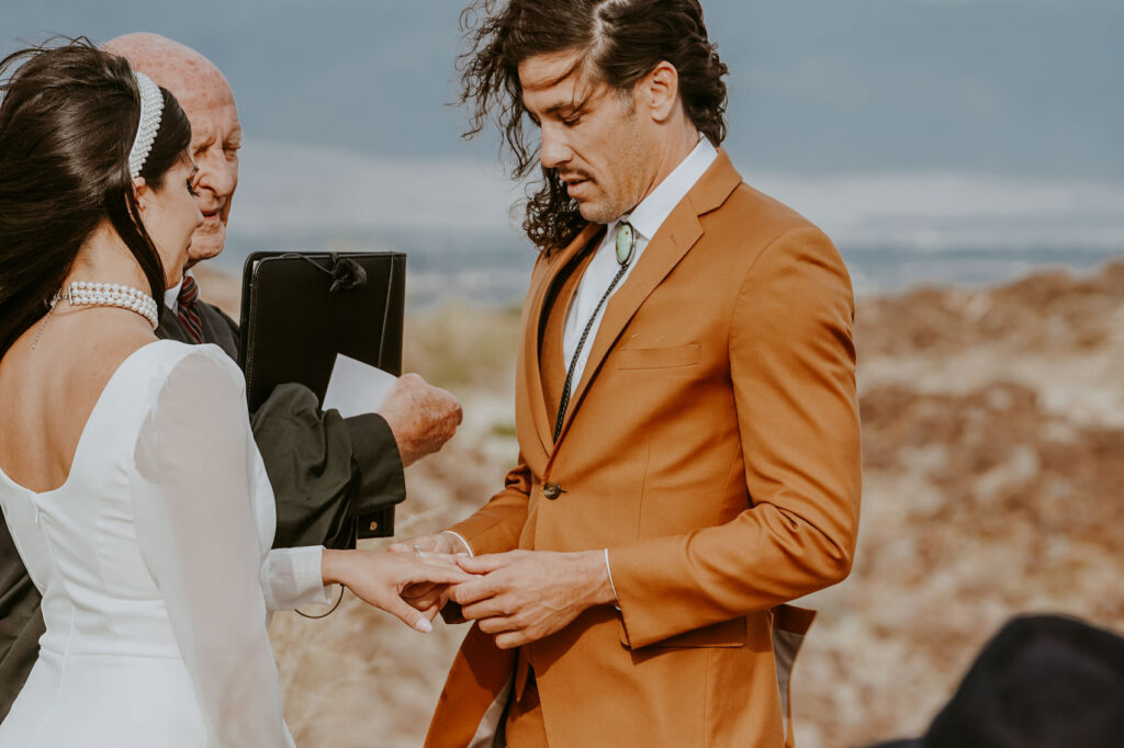 Groom saying vows — Desert Wedding Photography by Mattie O'Neill
