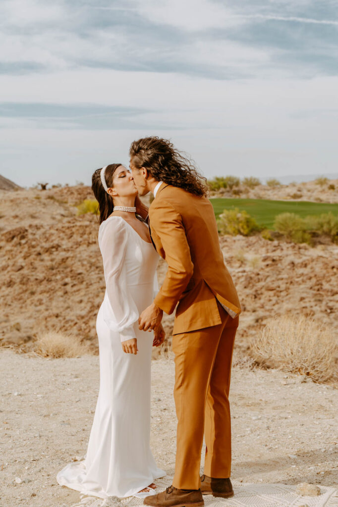 First kiss as husband and wife — Desert Wedding Photography by Mattie O'Neill