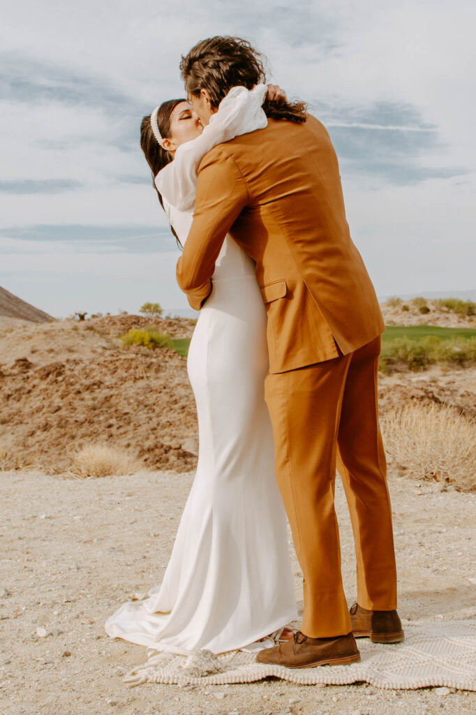 First kiss at wedding — Desert Wedding Photography by Mattie O'Neill