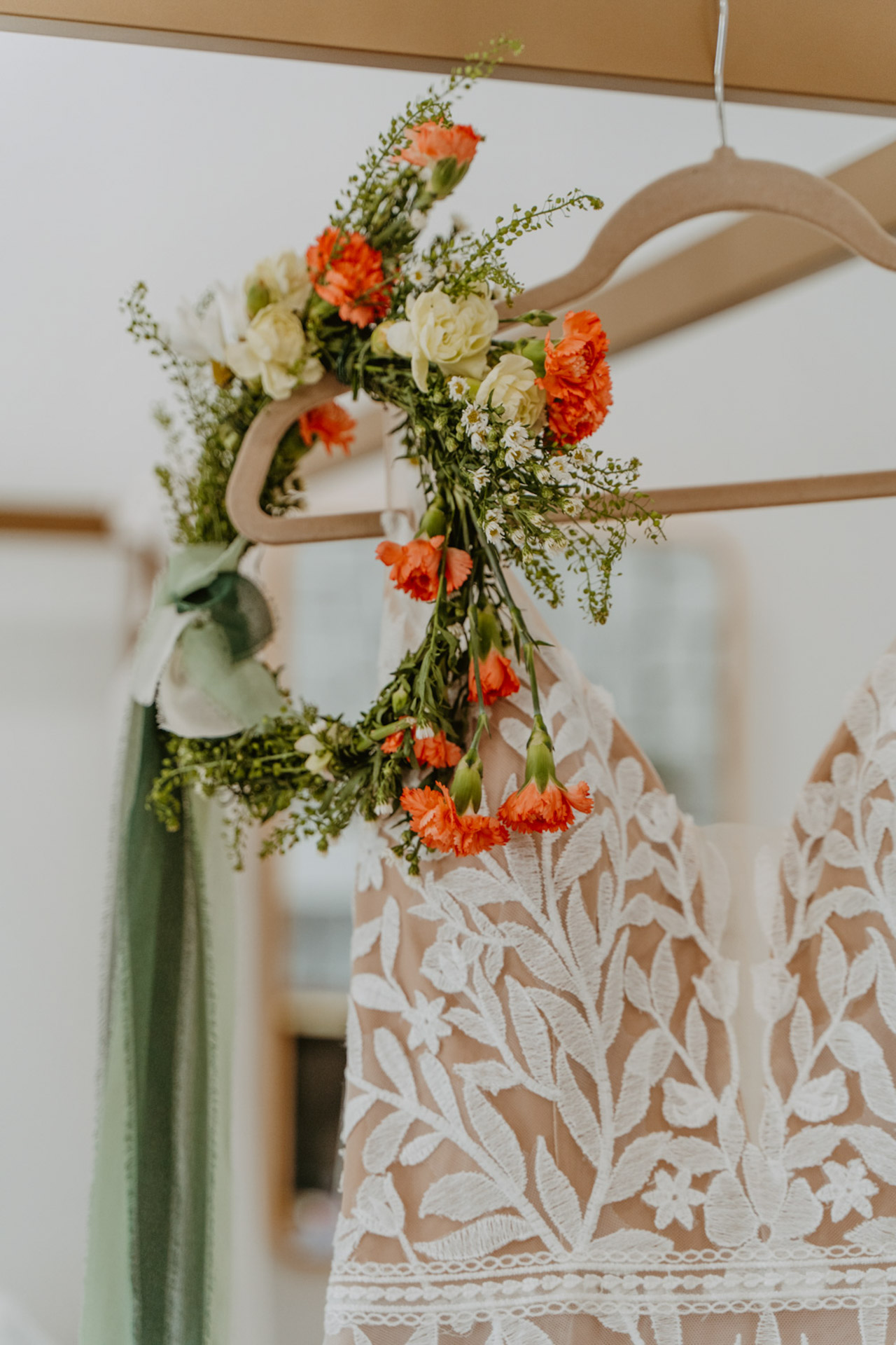 Flower crown on a hanger with dress Ring on a rose — Joshua Tree Wedding Photographer 