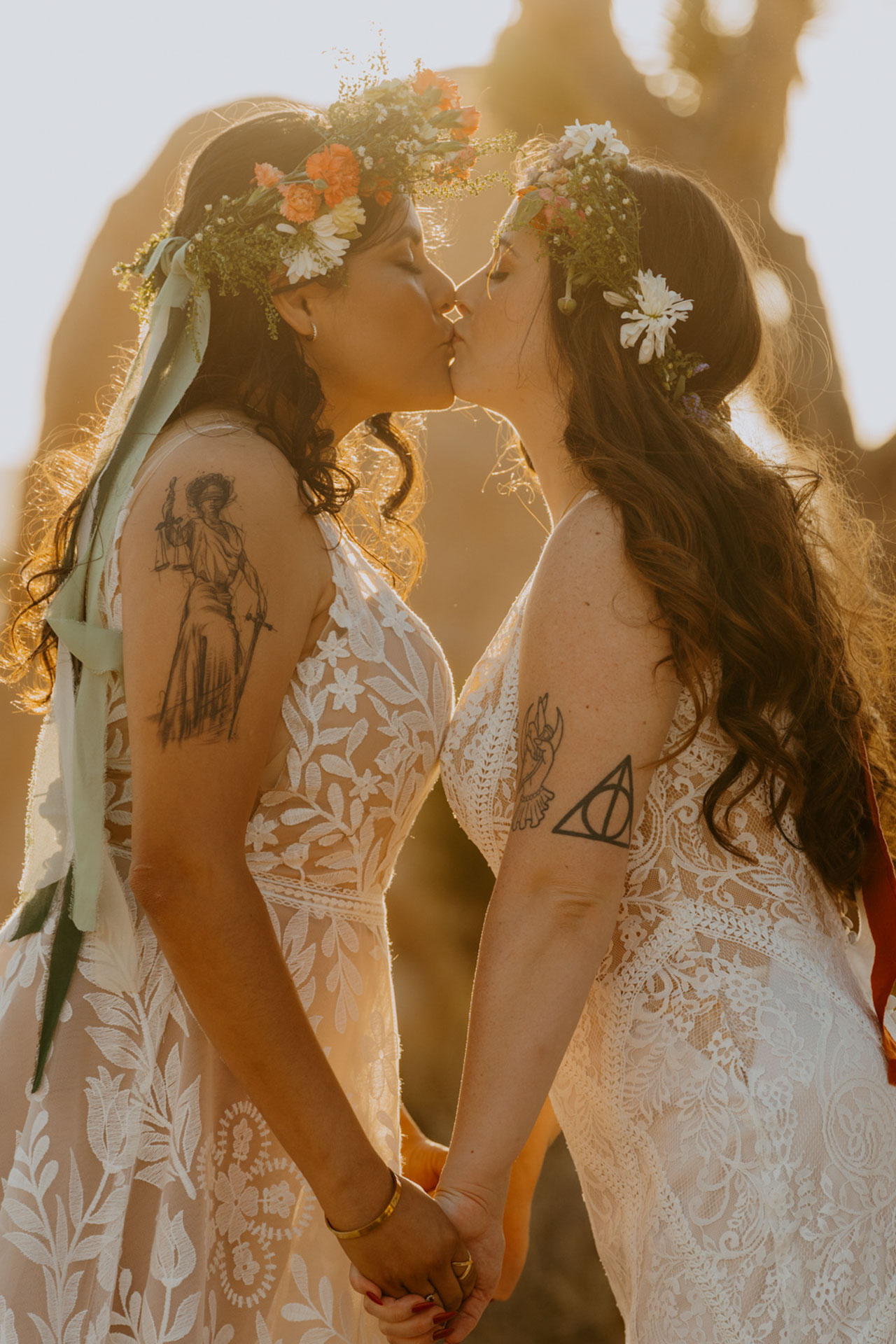 The brides kissing with the sun shining on the perfectly — Joshua Tree Wedding Photographer