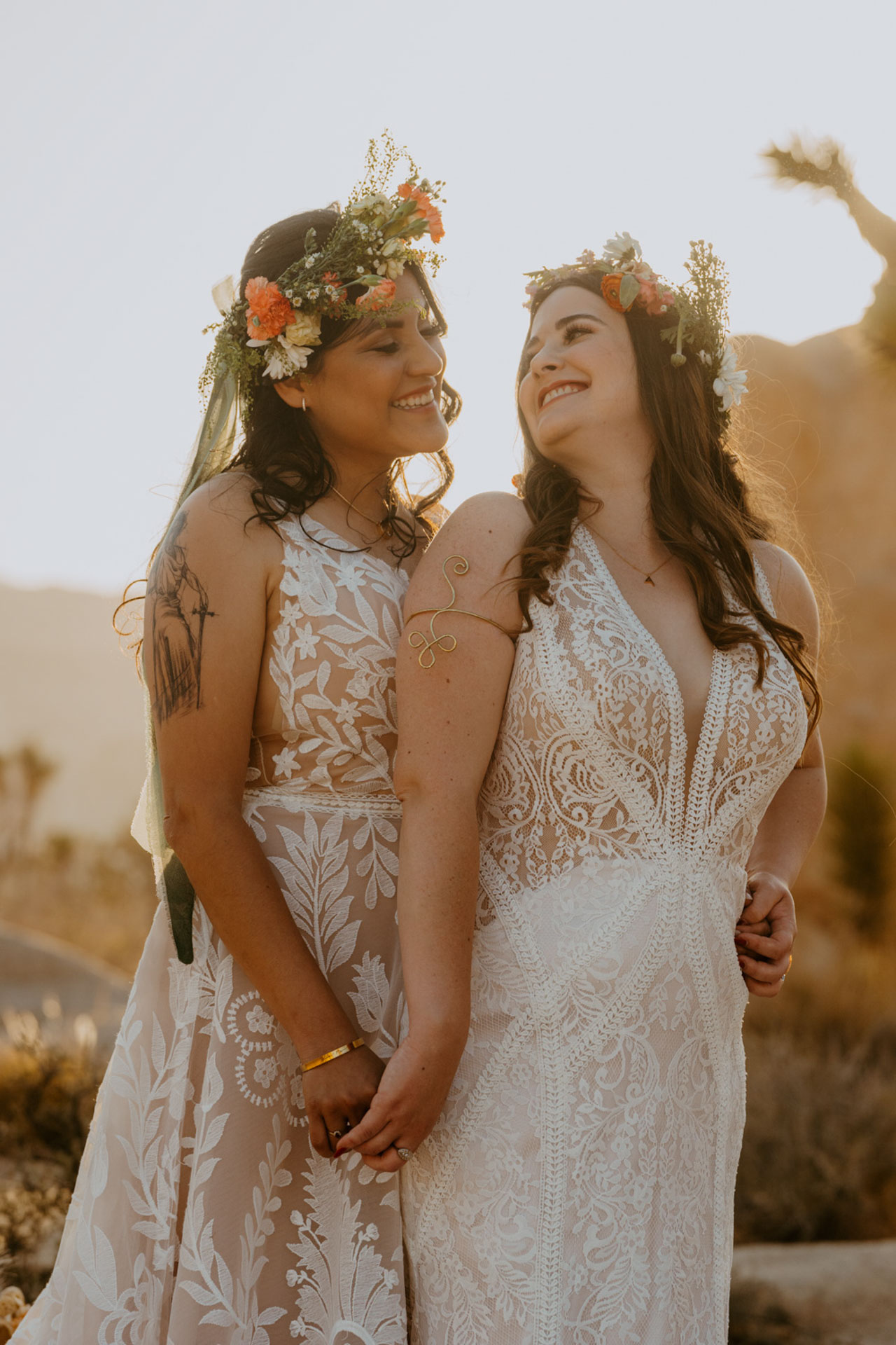 The brides looking at one another and smiling — Joshua Tree Wedding Photographer