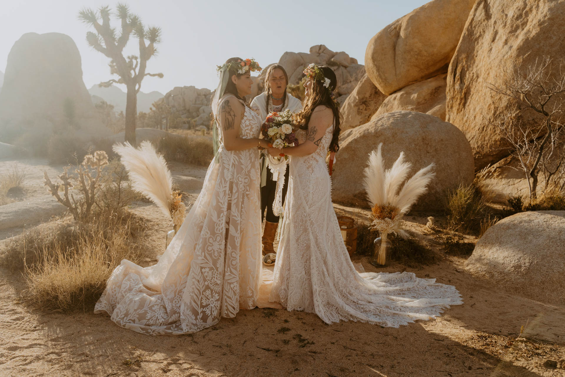 The brides during their ceremony in Hidden Valley — Joshua Tree Wedding Photographer