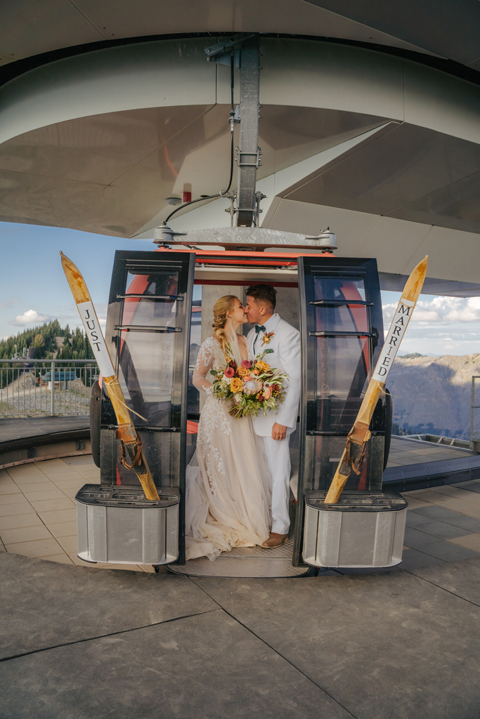 photograph of bride and groom on a ski slope at a Washington state wedding